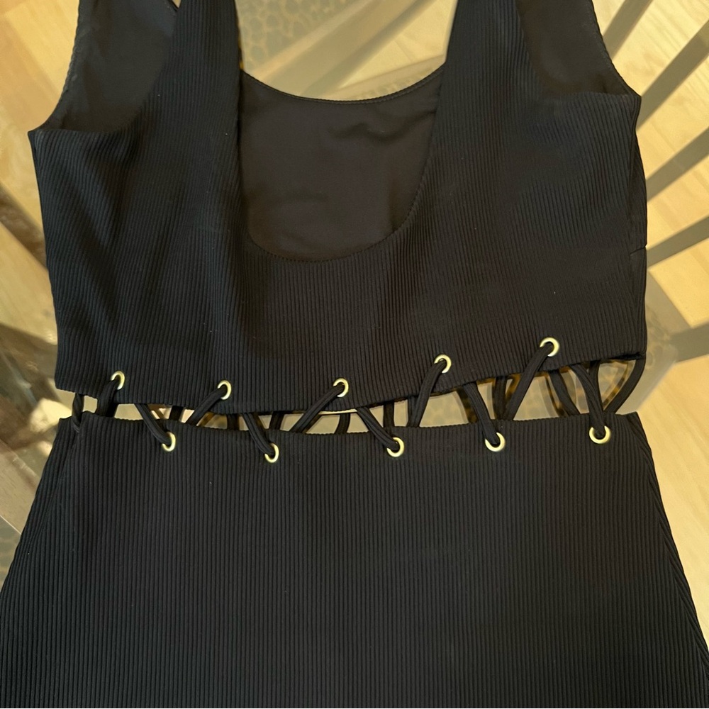 Black sleeveless midi dress with corset laced crop top skirt detail